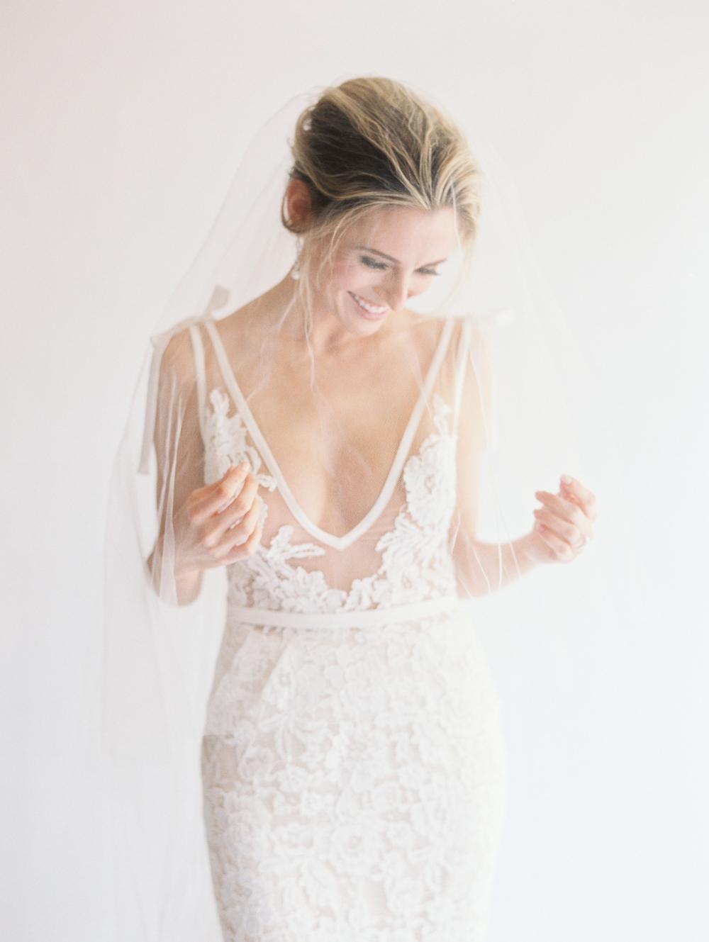 bare revealing bride dress