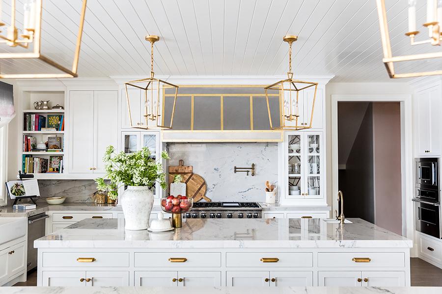 A Luxurious White Kitchen with Double Islands