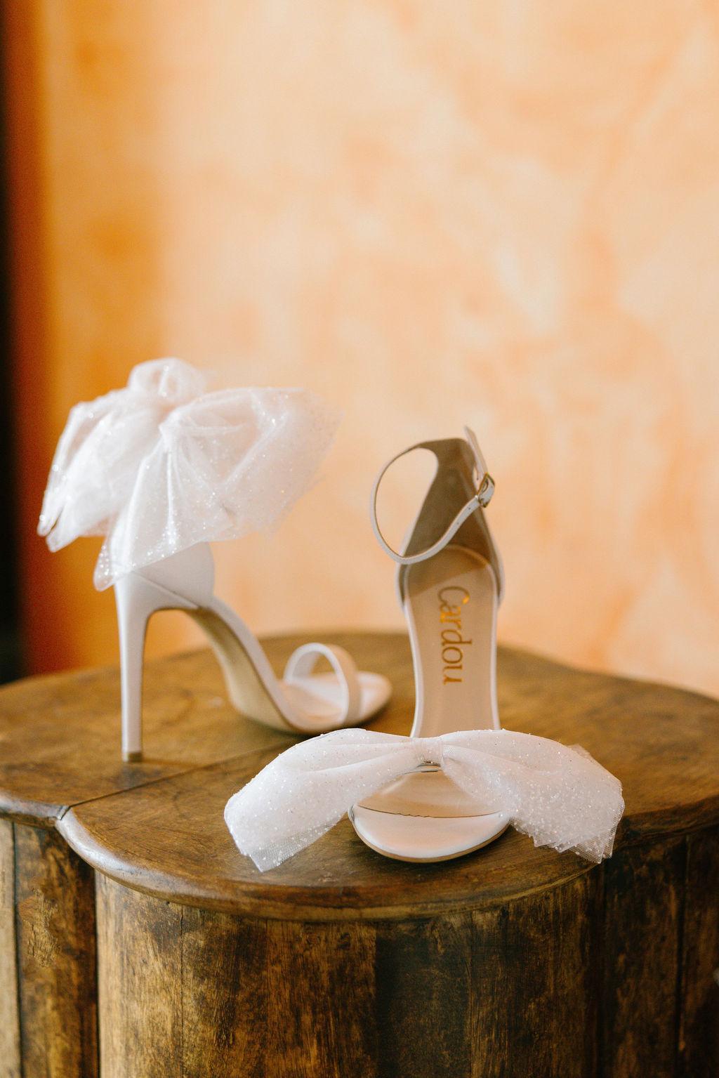A Mediterranean Wedding in Greece Defined by Sculptural Bows, Dreamy Florals, and Candlelight