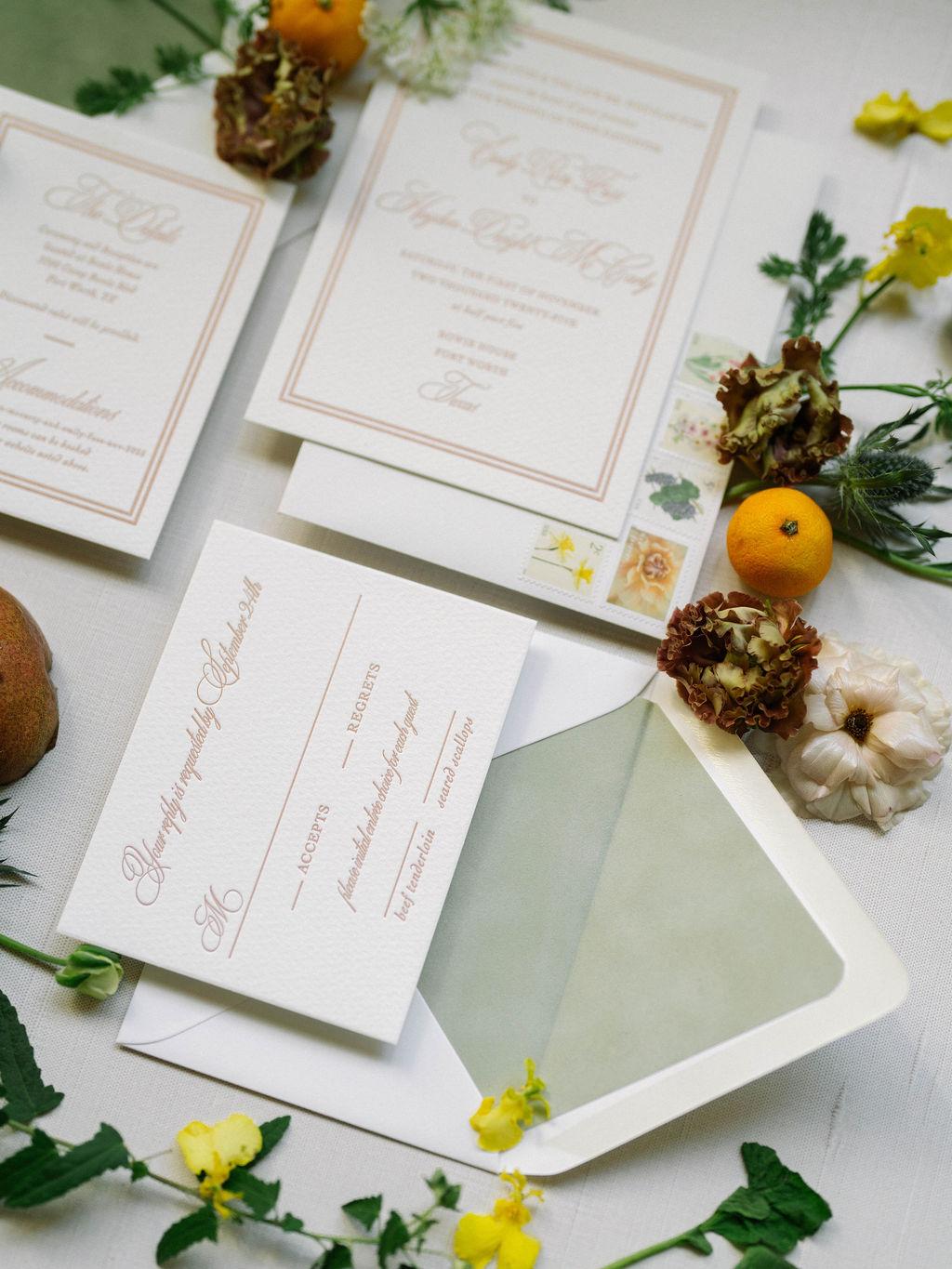 Invitation suite styled with citrus, pears and dried botanicals
