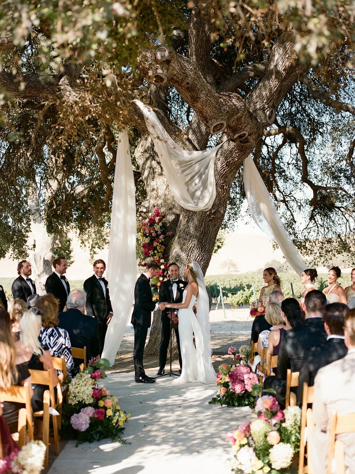 A Whimsical Wine Country Wedding Beneath an Oak Tree with European Garden Charm