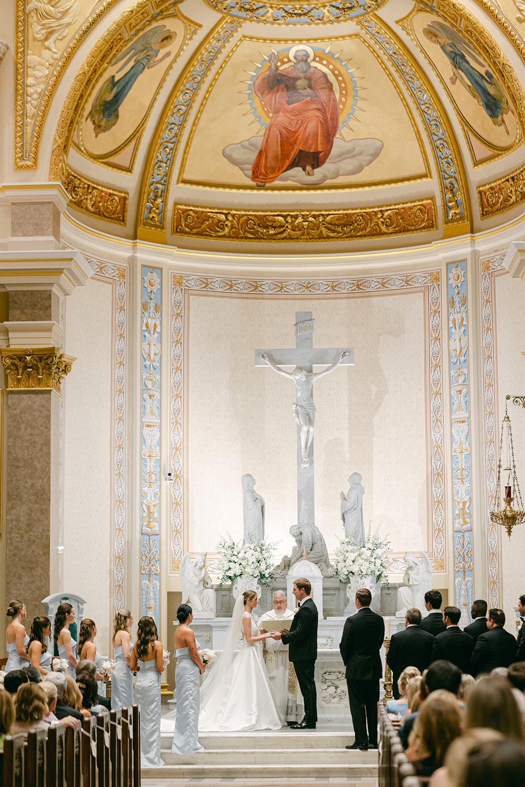The ceremony under the painted dome of the cathedral