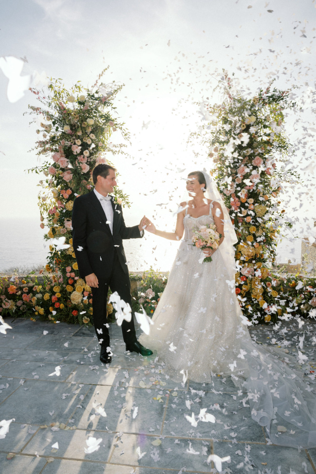 A Romantic Clifftop Wedding in Soft Hues of Blush, Peach, and Gold