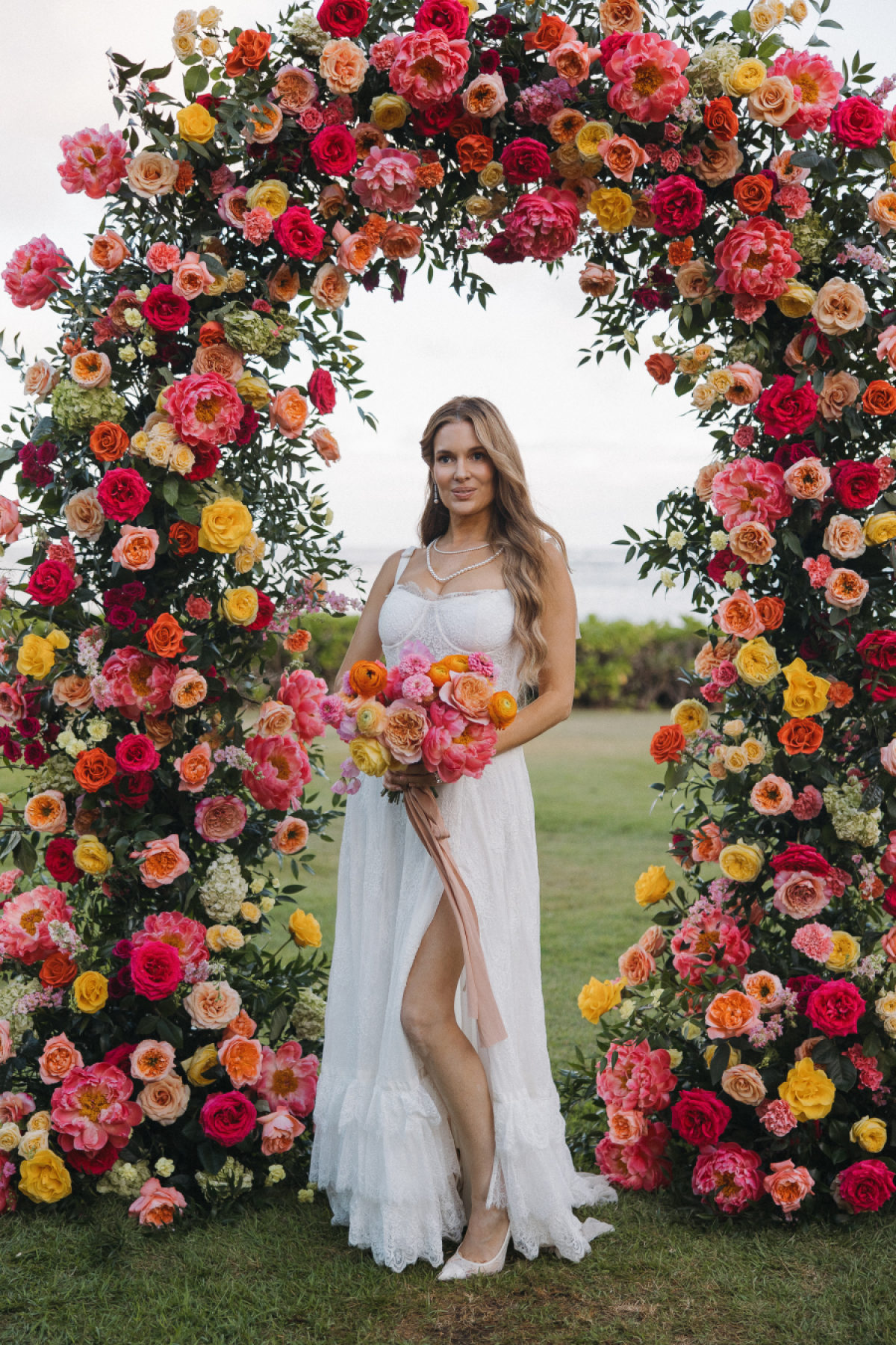 A Sunset-Hued Oceanfront Celebration Filled with Lush Florals at The Kahala Hotel & Resort
